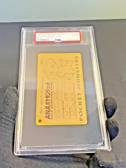 1998 Ana Pokemon Jet Gold Boarding Pass Mew #COMM PSA 9 MINT - Image 1