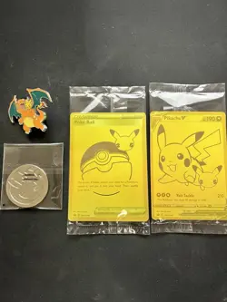 Pokémon Celebrations Gold Pikachu V/Gold Poke Ball/Pin/Coin NM - Image 1
