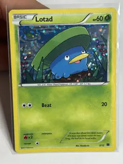 LP Lotad 2/12 McDonalds Promo Confetti Holo 2015 Pokemon Card - Image 1
