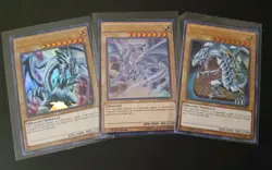3x BLUE-EYES WHITE DRAGON ULTRA RARE 1st Ed NM YUGIOH PLAYSET Different Arts - Image 1