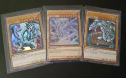 3x BLUE-EYES WHITE DRAGON ULTRA RARE 1st Ed NM YUGIOH PLAYSET Different Arts - Image 2