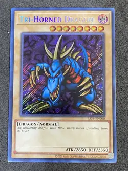 YuGiOh! Tri-Horned Dragon LOB-EN000 Secret Rare 25th Anniversary Mint Near Mint - Image 1
