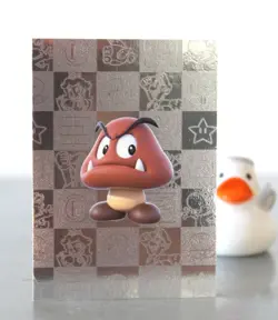 Super Mario card TCG - 179 - Goomba - Silver Card (foil) - Image 3