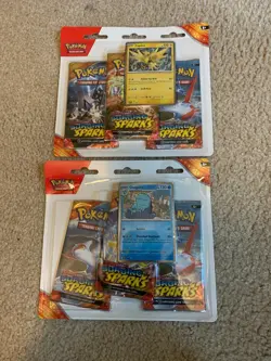 pokemon cards Surging sparks 3 pack blister varoom & tinkatink promo card sealed - Image 1