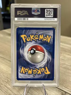 1999 POKEMON FOSSIL #4 DRAGONITE-HOLO PSA 7 NM - Image 2