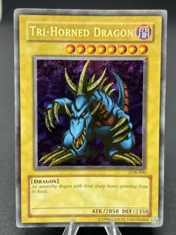 Tri-Horned Dragon (LOB-000) - LOB-000 - Secret Rare - Unlimited - Image 1