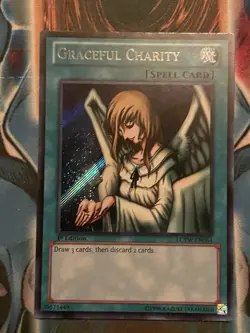 Graceful Charity LCYW-EN064 Yu-Gi-Oh Legendary Collection 3: Yugi's World-1st Edition 1st Edition - Image 1