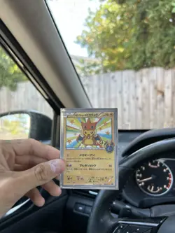 Pokémon TCG Poncho-Wearing Pikachu Mega Charizard x Promo 2016 - Image 1