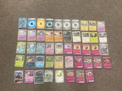 48 Pokemon Cards in English (includes duplicates) & Empty Card Holder Album - Image 2