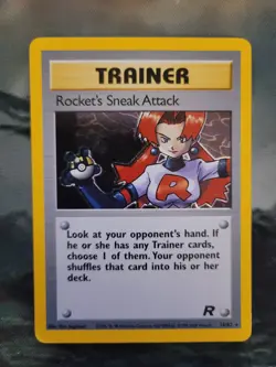 1995 Pokemon Rockets Sneak Attack Trainer Holo Card - Image 1