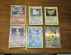 Vintage 1999 Pokémon Card Collection Mew Holo 1st Edition  Wizards Of The Coast - Image 1