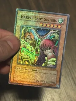 Yugioh Harpie Lady Sisters MRD-009 Super Rare Unlimited NM HEAVY HOLO BLEED - Image 1