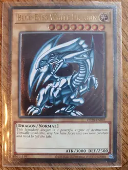 Yugioh OP28-EN001 Blue-Eyes White Dragon Ultimate Rare Europe NM - Image 1
