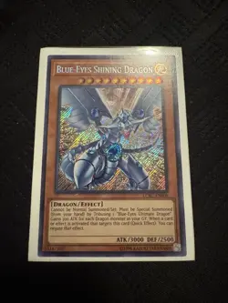 Yugioh Blue-Eyes Shining Dragon LCKC-EN008 Secret Rare NM - Image 1