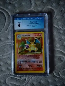 1999 Pokemon Base Set Unlimited #4 Charizard-Holo CGC 4 - Image 1