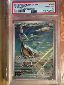 2024 PSA 10 Gem Mint Skarmory 209/191 Illustration Rare Surging Sparks Pokemon - Image 1