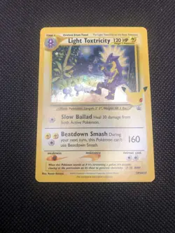 Light Toxtricity SWSH137 Celebrations Black Star Promo Pokemon Card Promo - Image 1
