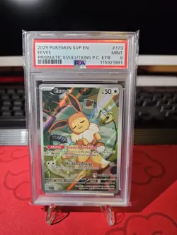 Pokemon Eevee 2025 #173 Prismatic Evolutions Pokemon Center ETB Exclusive PSA 9 - Image 1