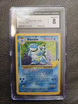Pokemon TCG Celebrations Blastoise Holo Card 2/102 CGC 8 - Image 1