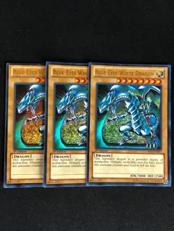 YUGIOH BLUE-EYES WHITE DRAGON SDBE-EN001 1ST ULTRA HP/CREASES X3 - Image 1