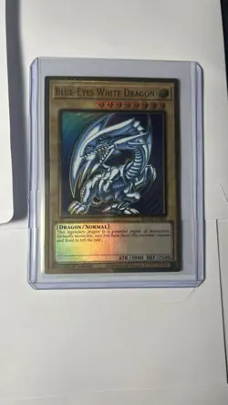 Yugioh! Blue-Eyes White Dragon MAGO-EN001 Gold Rare 1st Edition NM - Image 1