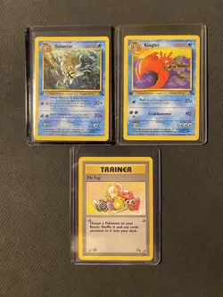 Lot Of Three Pokémon Fossil First Edition Cards - Image 1