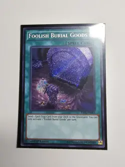 Yugioh! Foolish Burial Goods RATE-EN065 1st Edition Secret Rare Lightly Played - Image 1