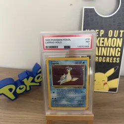1999 Lapras 10/62 Pokémon TCG Fossil Holo Rare Card PSA 7 Near Mint - Image 1