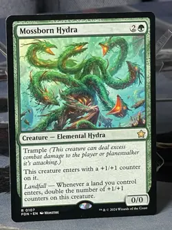 MTG Mossborn Hydra RARE Foundations Regular 107 NM/Mint - Image 1