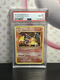 Pokemon PSA 8 Charizard 11/108 Evolutions Holo Rare Card Nintendo 2016 - Image 1
