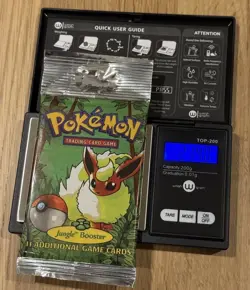 Vintage 1999 Pokémon Jungle Booster Pack Flareon Long Crimp 21.40 Grams Holo - Image 3