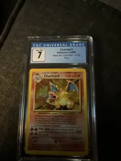 Charizard Pokémon Card Base Set 1999 CGC Graded 7 - Image 1