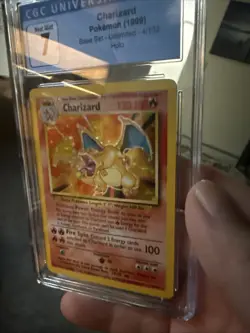 Charizard Pokémon Card Base Set 1999 CGC Graded 7 - Image 10