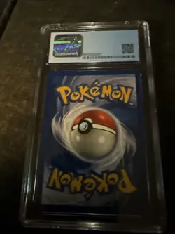 Charizard Pokémon Card Base Set 1999 CGC Graded 7 - Image 3