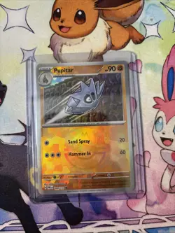 Pokémon TCG Pupitar Master Ball Pattern Holo Card 048/131 Prismatic Evolutions - Image 1
