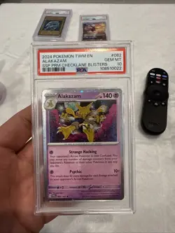 PSA 10 Alakazam 082/167 Surging Sparks Cosmos Holo Promo Pokemon Card POP 31 - Image 1