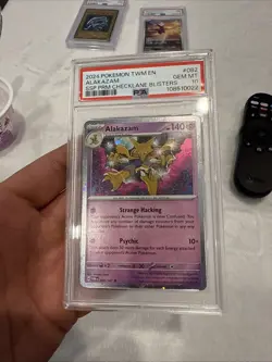 PSA 10 Alakazam 082/167 Surging Sparks Cosmos Holo Promo Pokemon Card POP 31 - Image 4