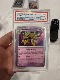PSA 10 Alakazam 082/167 Surging Sparks Cosmos Holo Promo Pokemon Card POP 31 - Image 6