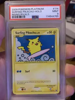 2009 Pokemon Platinum Surfing Pikachu Holo #114 Rising Rivals PSA 9 - Image 1