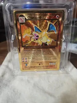 PokÃ©mon Celebrations Gold Metal Charizard Card 4/102 Ultra Premium - Image 1